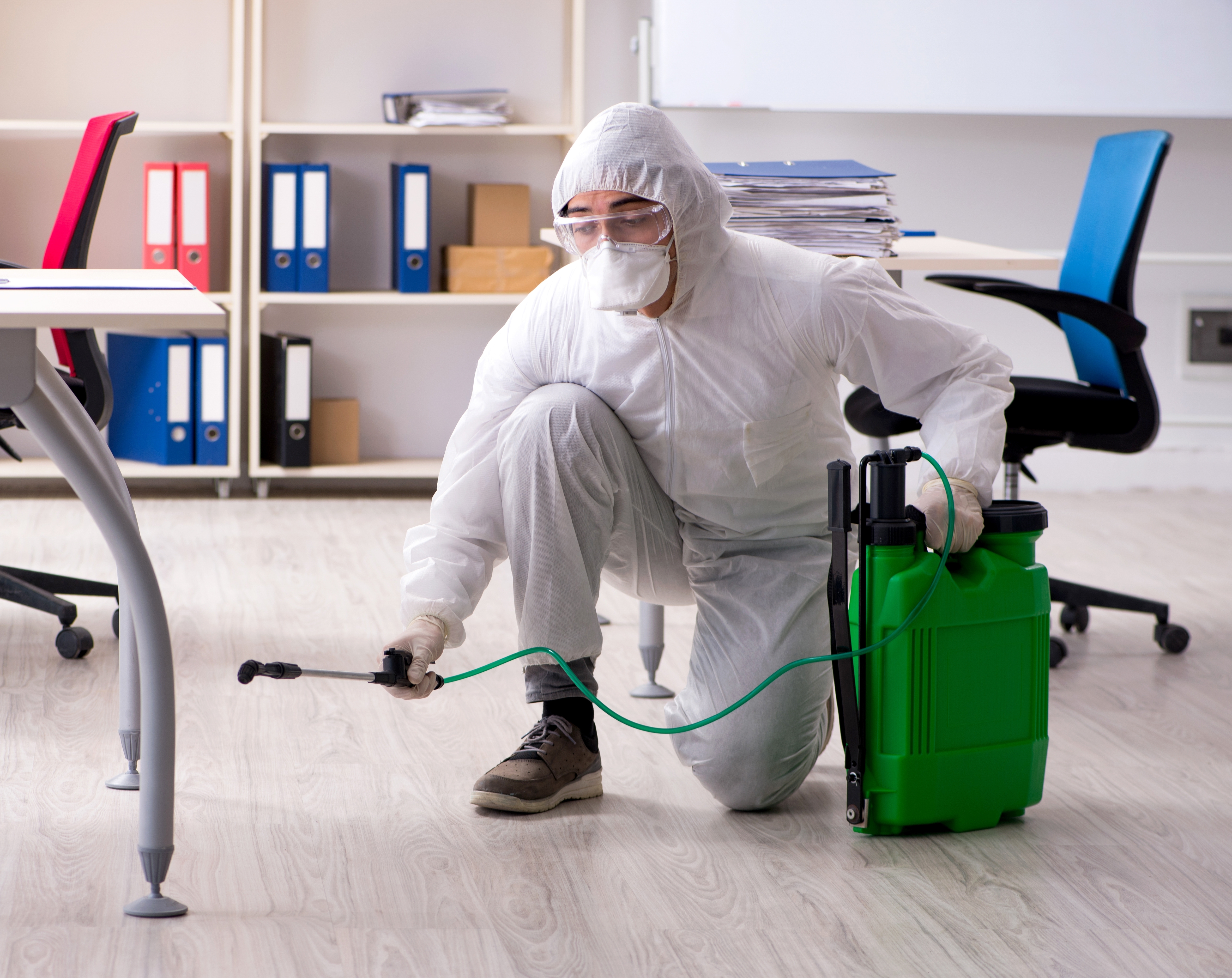 Commercial pest controller with bait station